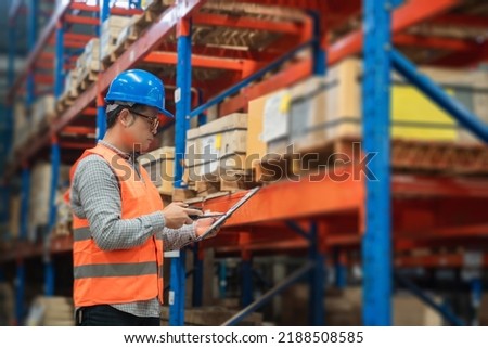 Manager  using tablet Checke-Commerce Online Orders e-businessonline. In store Background Warehouse Retail Center with  boxes global logistics network  Products Delivery Infographics in Logistics