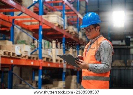 Manager  using tablet Checke-Commerce Online Orders e-businessonline. In store Background Warehouse Retail Center with  boxes global logistics network  Products Delivery Infographics in Logistics