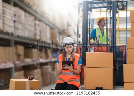 Manager  using tablet Checke-Commerce Online Orders e-businessonline. In store Background Warehouse Retail Center with  boxes global logistics network  Products Delivery Infographics in Logistics