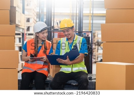 Manager  using tablet Checke-Commerce Online Orders e-businessonline. In store Background Warehouse Retail Center with  boxes global logistics network  Products Delivery Infographics in Logistics