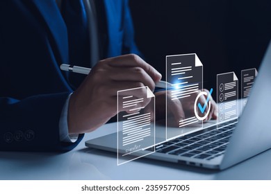 Manager is verifying the validity, security, approving requests, quality assurance, investment contracts. Online digital document work, paperless office. online survey. Checking mark up on check boxes - Shutterstock ID 2359577005