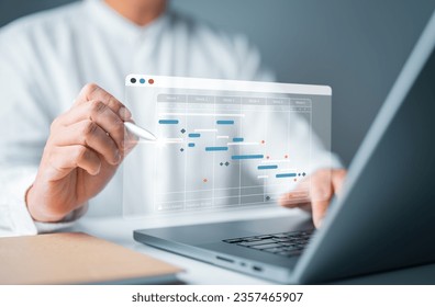 Manager working with Gantt chart schedule for plan tasks and progress. Corporate strategy for construction, operations, sales, to-do list, and marketing. Project management planning software concept. 