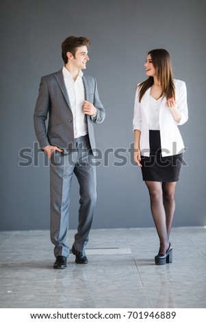Managers talking to each other against a office background