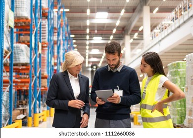 Managers And Workers In Distribution Center