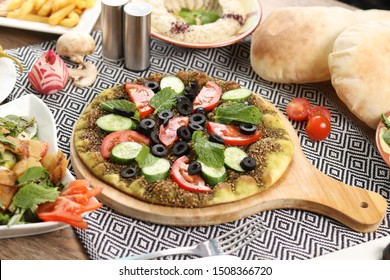 Manakish Zaatar And Vegetable And Salad