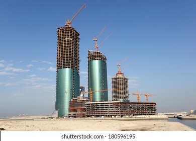 MANAMA, BAHRAIN - DEC 19: Skyscraper construction at the Bahrain Financial Harbour. December 19th 2013 in Manama, Kingdom of Bahrain, Middle East 