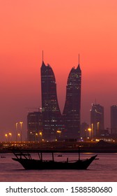 MANAMA , BAHRAIN - DECEMBER 03: Bahrain Skyline and traditional dhow during sunset on December 03, 2019, Bahrain