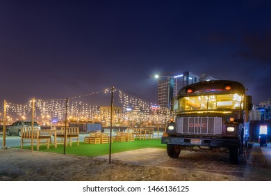 MANAMA, BAHRAIN - JULY 30, 2019: Vintage Food Truck On Wheels At Night Street, Seef, Manama, Bahrain