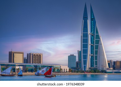 MANAMA , BAHRAIN - MAY 17: Bahrain skyline with iconic buildings, the Bahrain Financial Harbour and World trade center along with arabic traditional dhow, May 17, 2021.