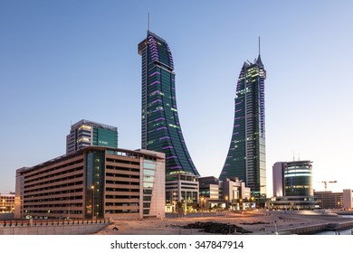 MANAMA, BAHRAIN - NOV 14: Bahrain Financial Harbour Skyscrapers in Manama illuminated at dusk. November 14, 2015 in Manama, Kingdom of Bahrain
