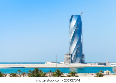Manama, Bahrain - November 21, 2014: Modern skyscraper building United Tower under construction in Manama city, Capital of Bahrain Kingdom