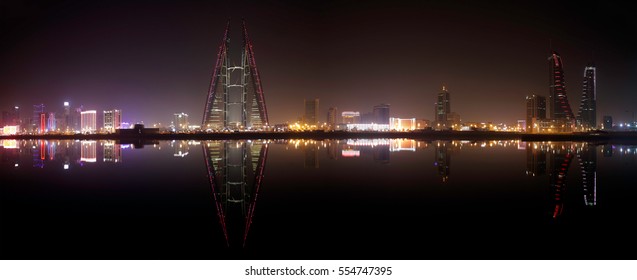 MANAMA , BAHRAIN - NOVEMBER 30: Panormic view of Bahrain skyline with iconic buildings, Bahrain Financial Harbour and World Trade center at night, Manama, Bahrain on November 30, 2016