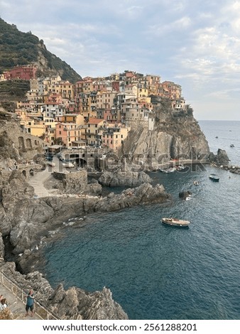 Similar – Image, Stock Photo Manarola is one of the most beautiful villages in Italy. The Cinque Terre is a rugged coastline of the Ligurian Riviera and is made up of five beautiful hilltop villages.