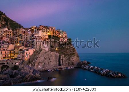 Manarola Village, Cinque Terre Coast of Italy. Manarola a beautiful small town in the province of La Spezia, Liguria, north of Italy and one of the five Cinque terre travel attractions, Sunset colors