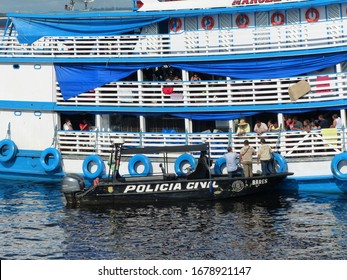 Manaus AM Brazil. March 21, 2020. Because Of Covid 2019, The State Of Amazonas Has Ordered That Boats Are No Longer Allowed To Sail On The Amazon Rivers. Here The Civil Police Inspect A Passenger Ship