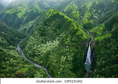 Manawaiopuna Falls in Kauai, Hawaii are better known as the waterfalls from Jurassic Park and can only be seen from a helicopter tour.