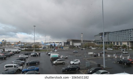 Manchester Airport Outdoor Parking In Raining Taking Through The Mirror In Manchester, England On 28 April, 2016. 