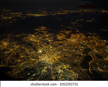 Manchester City At Night Showing Power Grid From Airplane Window