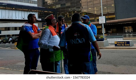 Manchester, England 06/06/2019: Indian Cricket Fans At Manchester Airport. Wearing Indian Colours 