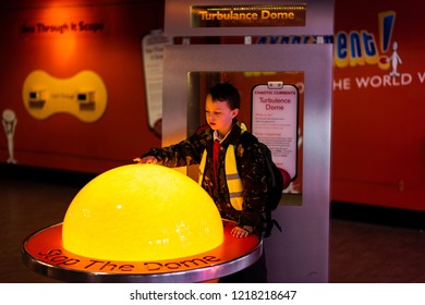 Manchester, England - 1st April 2018 - A Little Boy With ADHD, Autism, Asperger Syndrome Enjoys A Trip To Manchester Science Museum With His Primary School, Wearing A High Visibility Jacket