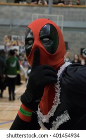 MANCHESTER, ENGLAND - APRIL 2, 2016: Deadpool Cosplayer poses at the Manchester Anime and Gaming Convention