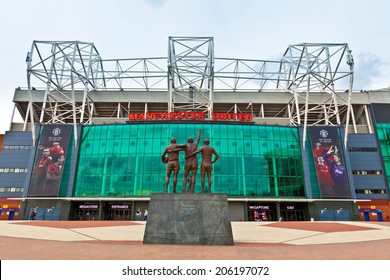  MANCHESTER, ENGLAND - JULY 6, 2014: Old Trafford stadium is home to Manchester United one of the wealthiest and most widely supported football teams in the world.