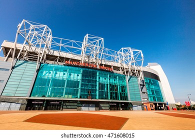 MANCHESTER, ENGLAND - MAY 29, 2016: Old Trafford stadium is home to Manchester United one of the wealthiest and most widely supported football teams in the world.