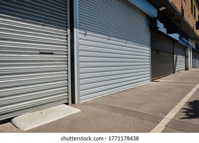 Manchester, England, UK - 05/25/2020: (Covid-19 UK 2020): Shuttered Small Business Shop Fronts, South Manchester, England, UK.