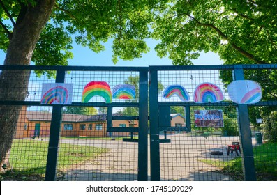 Manchester, England, UK - 05/27/2020: CoVid-19 (UK 2020). Gate To School In Manchester Suburbs Displaying Art Supporting NHS Workers.