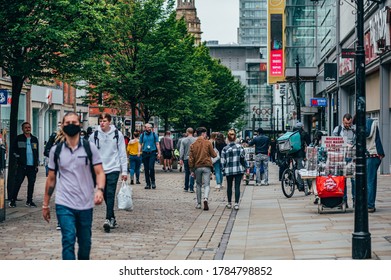 MANCHESTER, ENGLAND, UK - 24 JULY, 2020 City Centre Of Manchester, People In Face Masks While Shopping