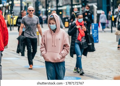 MANCHESTER, ENGLAND, UK - 24 JULY, 2020 City Centre Of Manchester, People In Face Masks While Shopping