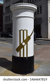 Manchester, Greater Manchester, UK. July 29, 2019. White Post Box Next To Town Hall Celebrating ICC Cricket World Cup Wins Of Both Men's And Women's Team In 2019 And 2017. Clarence Street Sign Visible