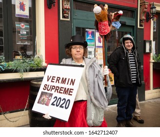 MANCHESTER, NEW HAMPSHIRE, USA - FEBRUARY 11, 2020: A Supporter Of Libertarian 2020 Presidential Candidate Vermin Supreme Is Seen In Downtown Manchester, New Hampshire.