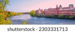 Manchester skyline, New Hampshire over the Merrimack River panorama at sunrise