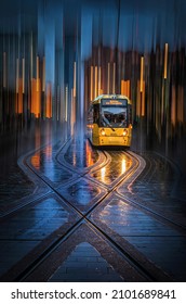 Manchester Tram At Stop In Rain With ICM