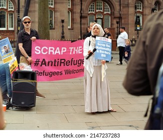 Manchester, UK - 16 April 2022: Activists Against Deportation Of Refugees In UK Speaked In St Peter's Square.