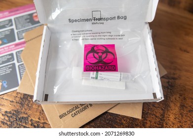 Manchester, UK - 19 October, 2021: Coronavirus Kit For COVID19, Travel Test For Day 2, 5 Or 8, Prepared For Being Posted. Collection Tube With Stabilizing Solution, Swab, All The Packaging.