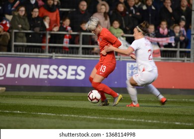 Manchester, UK - 5 April 2019: Canada's Sophie Schmidt With The Ball Being Pulled Back By England's Lucy Bronze