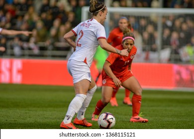 Manchester, UK - 5 April 2019 England's Lucy Bronze Takes On Canada's Desiree Scott During The Game