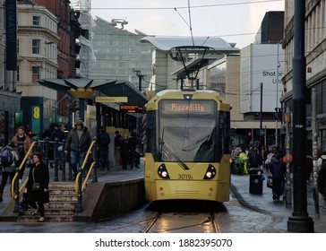 Manchester, UK - 9 February 2020: A Metrolink Tram (no. 3019) At Market Street Tram Stop On A Rainy Day.