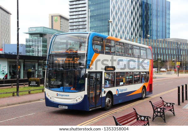 MANCHESTER, UK -\
APRIL 22, 2013: People ride Stagecoach city bus in Manchester, UK.\
Stagecoach Group has 16 percent bus market in the UK. Stagecoach UK\
employs 18,000\
people.