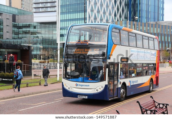 MANCHESTER, UK -\
APRIL 22: People ride Stagecoach city bus on April 22, 2013 in\
Manchester, UK. Stagecoach Group has 16% bus market in the UK.\
Stagecoach UK employs 18,000\
people.