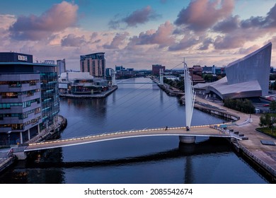 Manchester, UK. August 10, 2021. Aerial view of the Media City UK is on the banks of the Manchester Ship Canal in Salford and Trafford, Greater Manchester, England at dusk.