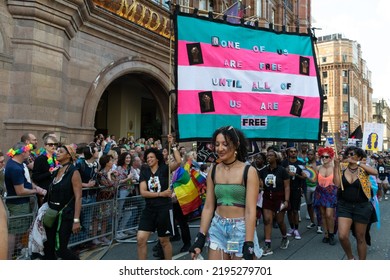 Manchester UK. August 27, 2022. Manchester Pride Parade. Banner Text None Of Us Are Free Until All Of Us Are Free. Theme March For Peace.