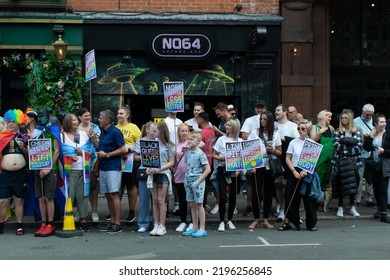 Manchester UK. August 27, 2022. Manchester Pride Parade. Crowd Outside NQ64 With Signs. Theme March For Peace.