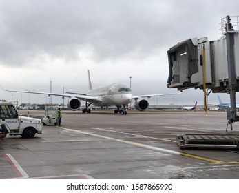 Manchester/ U.K. - December 10 2019: Qatar Airways Airbus A350 taxiing onto stand at Manchester Airport