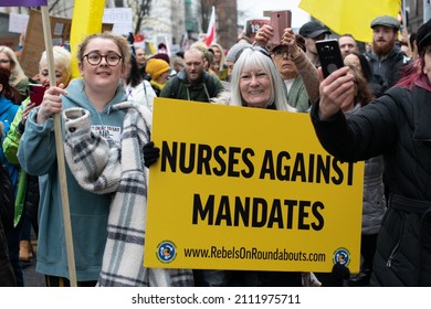 Manchester UK. January 22, 2022. Anti Vax Protest Deansgate. Protester Holding Sign Text Nurses Against Mandates