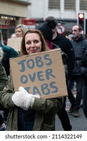 Manchester UK. January 22, 2022. Anti Vax Protest Deansgate. Protester Holding Banner Text Jobs Over Jabs