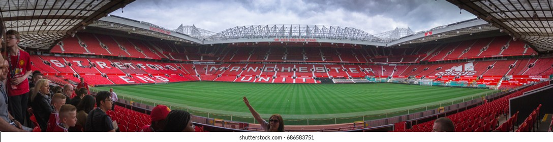 MANCHESTER, UK - JULY 08, 2017: Panorama View Inside Old Trafford Stadium With Dark Clouds On The Sky, Manchester United, England