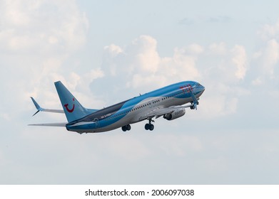 Manchester, UK - July 10th 2021: TUI Boeing 737-MAX Retracting Wheels After Take Off From Manchester Ringway International Airport 